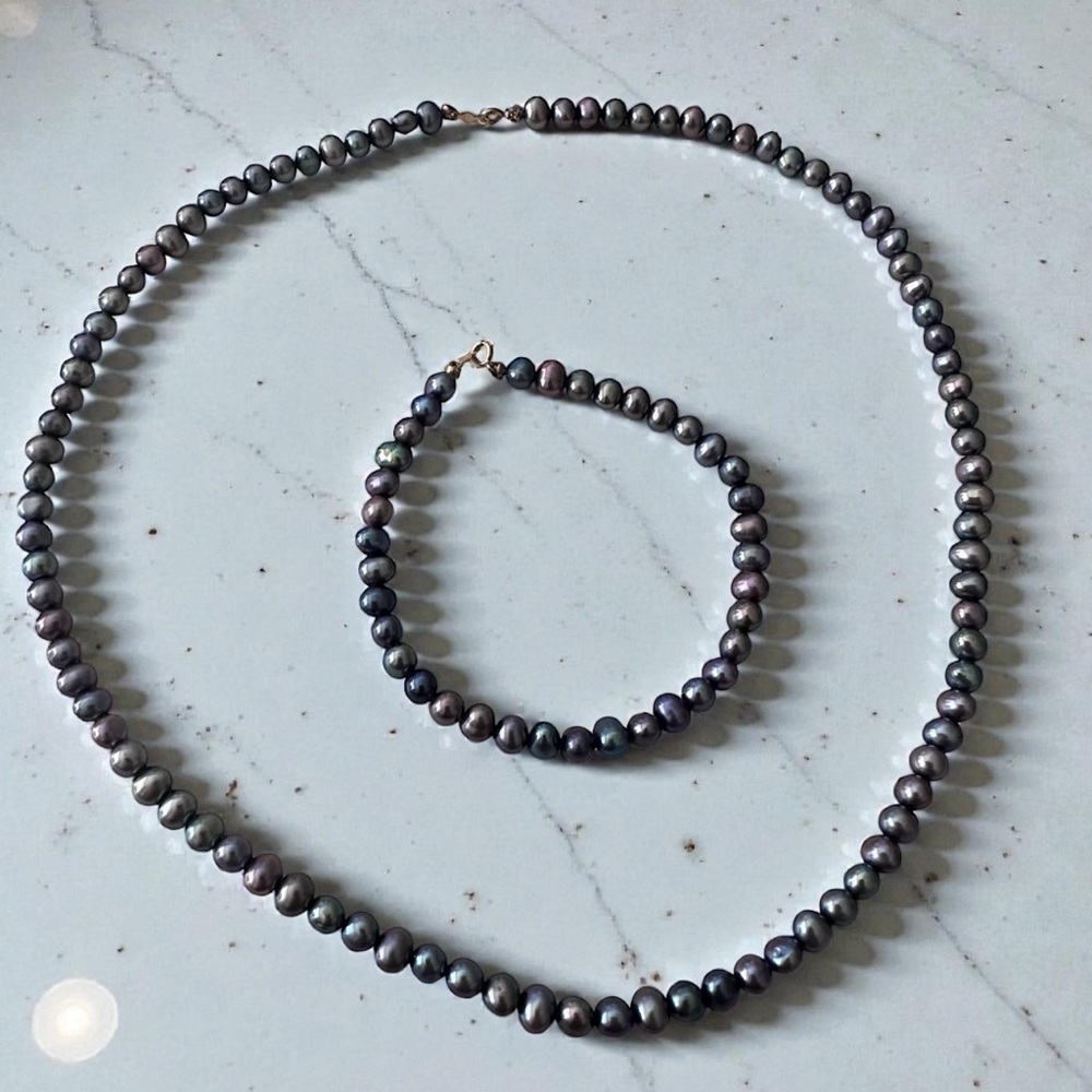 Unique‎ and rare 5mm Tahatian Pearl set with 14k gold clasp marked 585